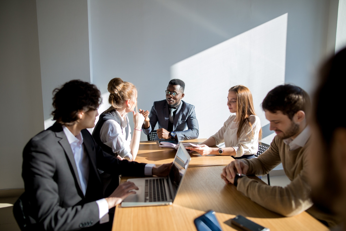 Coworkers going over information on a meeting