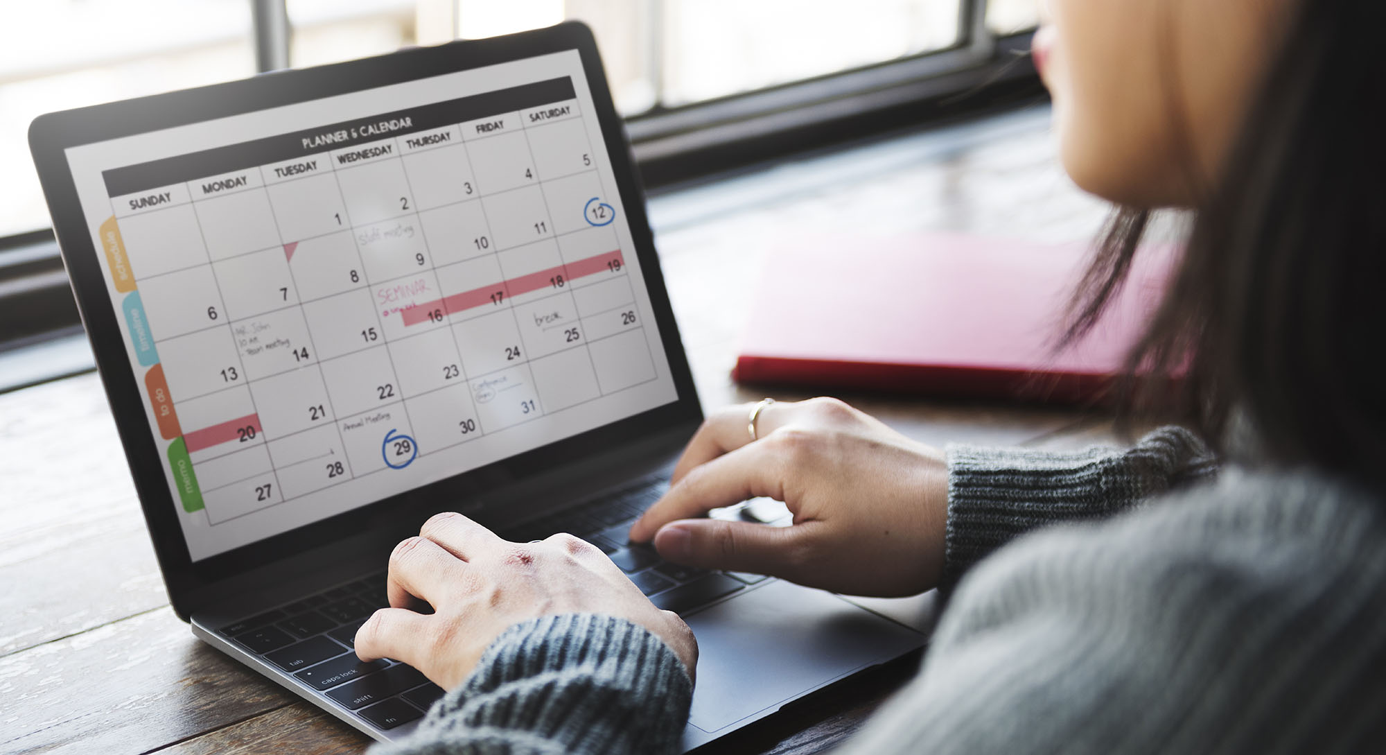 Woman checking her digital calendar