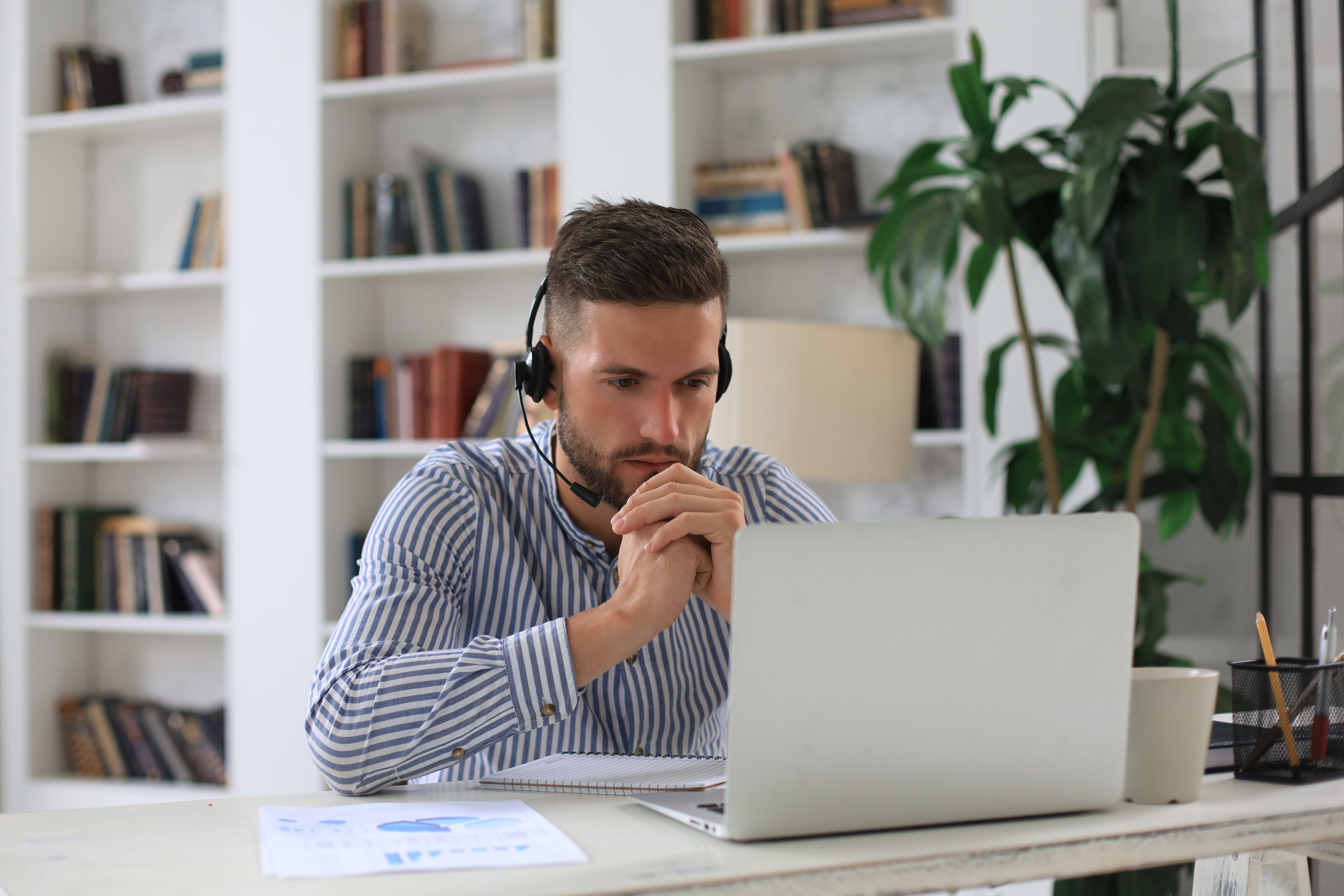 Woman watching videos on laptop